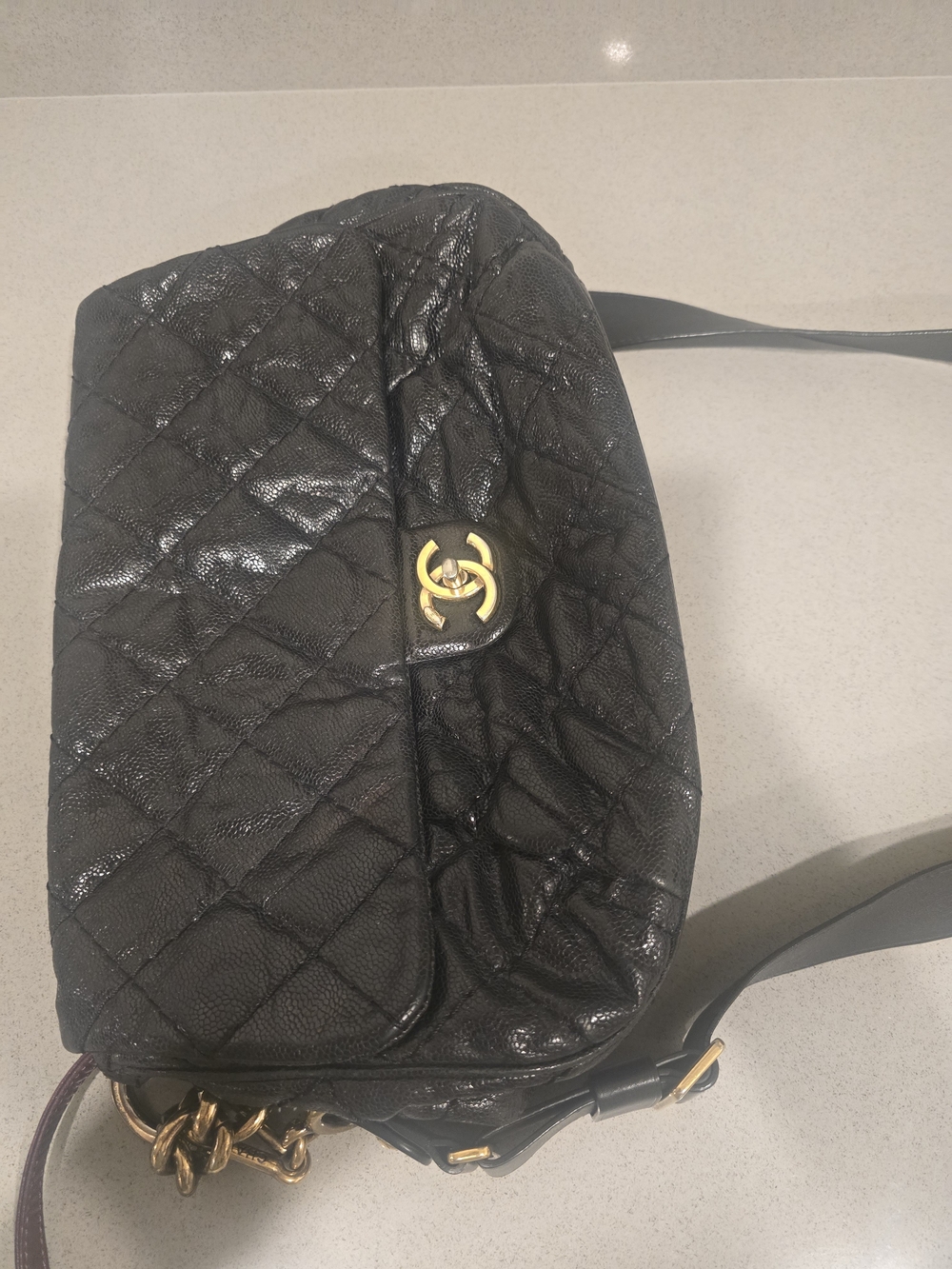CHANEL Black Quilted Shoulder Bag with Gold Turn-Lock, Long Cross Body Strap